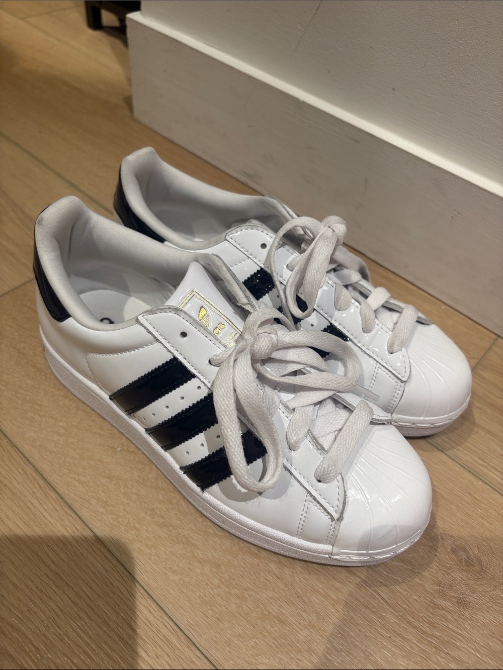 Shiny white adidas super star